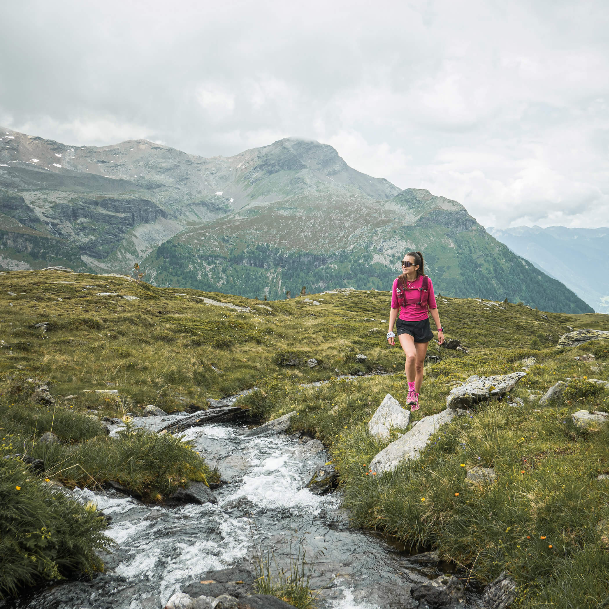 Hiker on the way to the Kofler Lakes in the Vedrette di Ries-Aurina Nature Park - OLM Nature Escape